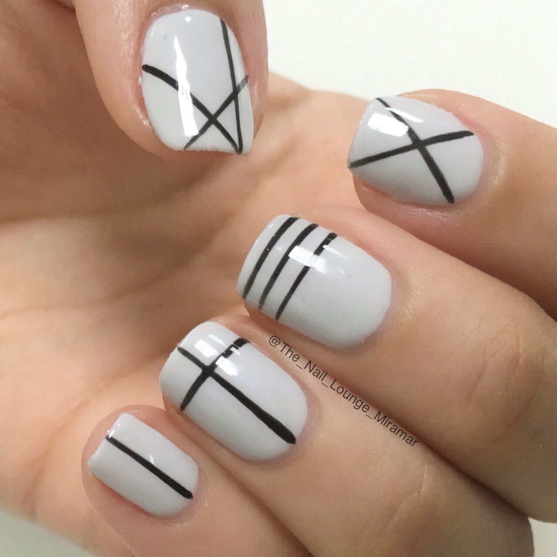 Catchy grey black design Stripe nail art