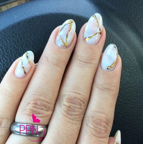 Lovely golden lines Marble nail art