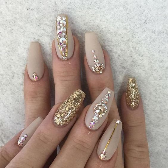 Marvelous golden stones Glitter nail art