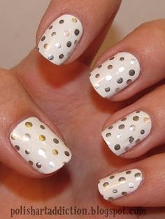 Pretty white and silver Polka dots nail art