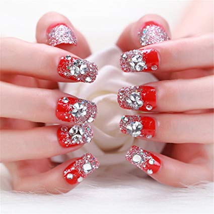 Trending orange glitter Stones nail art