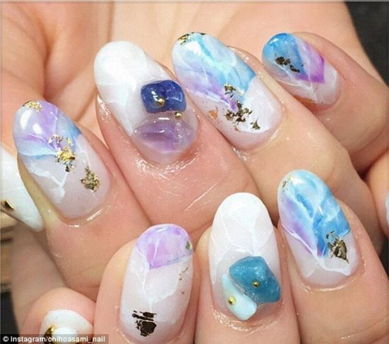 Wonderful floral white blue Stones nail art