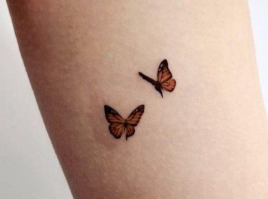 Mind Blowing Flying Butterfly Tattoo Design