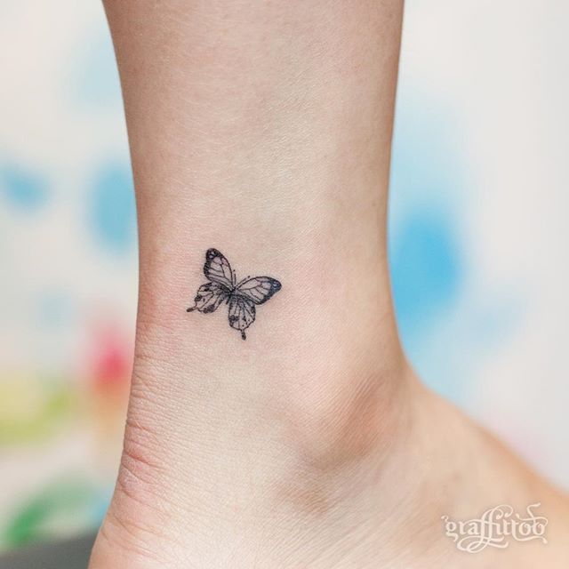 Smallest Butterfly Tattoo Made With Black Ink On Ankle